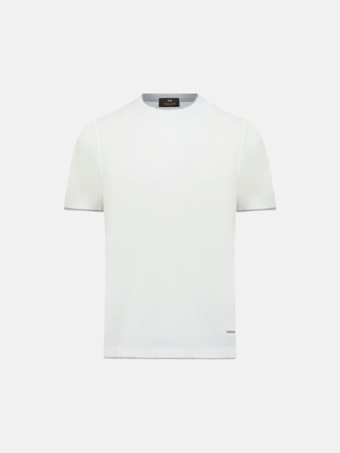 White t-shirt on a light gray background